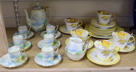 A Shelley yellow Phlox pattern part tea service and a Grafton Snowdonia coffee service,